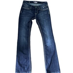 berock for express styled in Los Angeles, blue low rise boot cut jeans